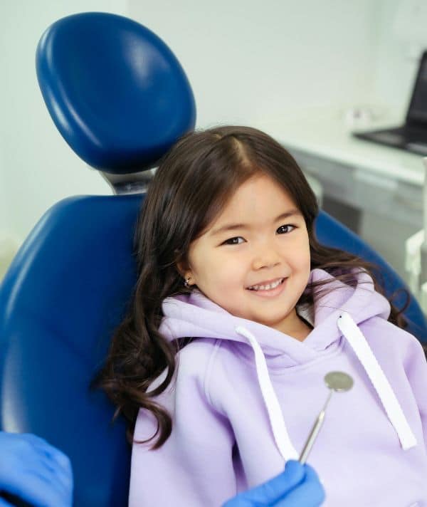 Girl smiling at the Paediatric dentist in Bondi